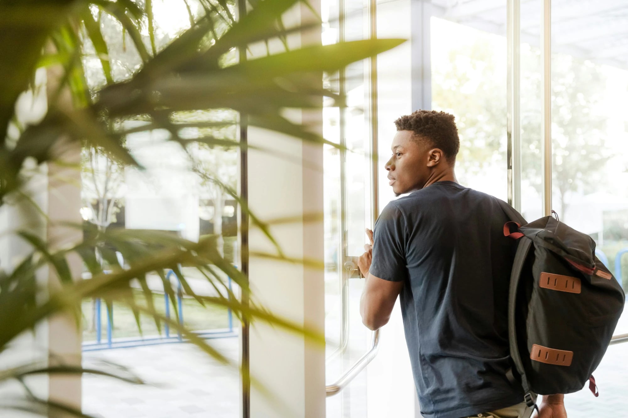 Student holding a folder in a furnished student stay apartment